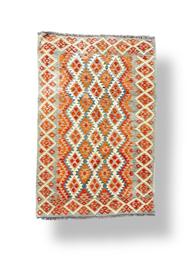 Lot 558 - A flat weave kilim rug, in blue and orange,...