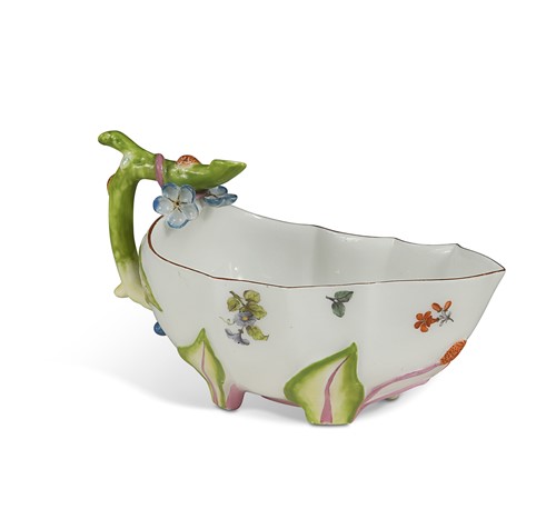 Lot 686 - A Chelsea strawberry leaf sauceboat, circa 1752-55