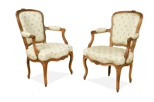 Lot 584 - A pair of Louis XV style walnut open armchairs, late 19th century
