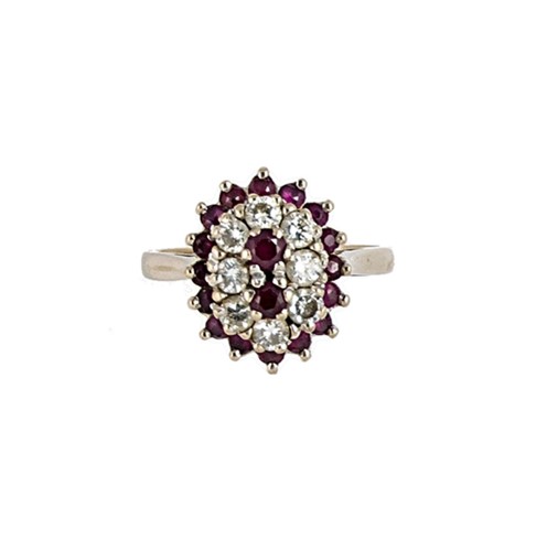 Lot 94 - An 18ct gold ruby and diamond cluster ring