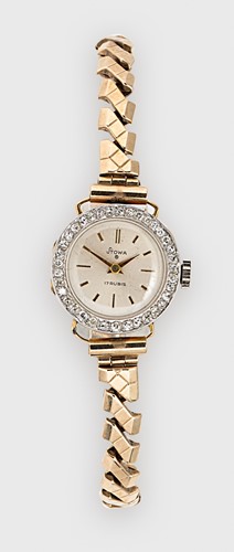 Lot 282 - Stowa - An 18ct gold and diamond set cocktail watch