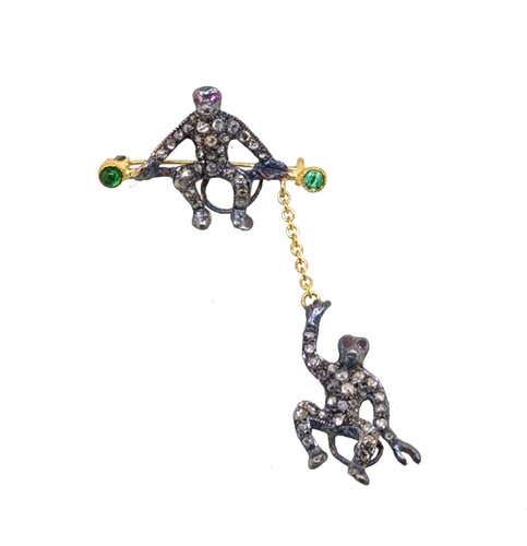 Lot 82 - A diamond, emerald and ruby monkey brooch/pendant