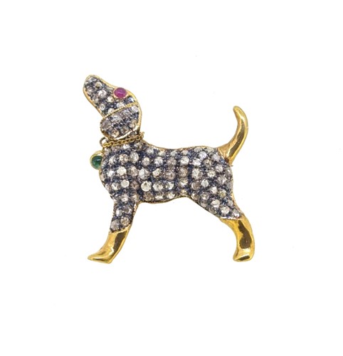 Lot 148 - A diamond, ruby and emerald dog brooch