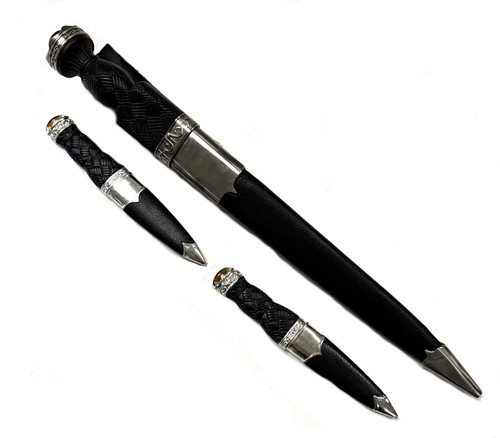 Lot 317 - A Highland dirk and two Sgian Dubhs