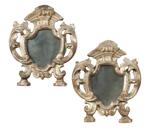 Lot 445 - A pair of small Venetian carved and silvered wood wall mirrors, 18th century