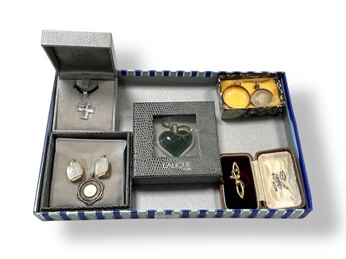 Lot 252 - A modern Lalique green glass heart pendant, a...