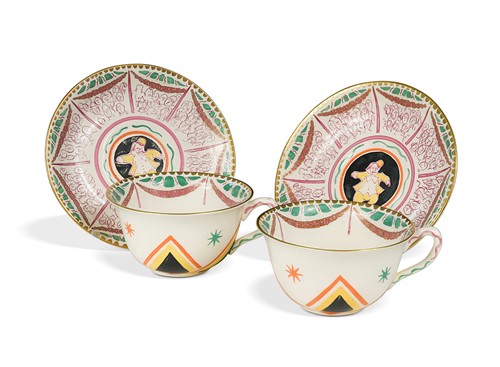 Lot 77 - Dame Laura Knight (1877-1970) for Clarice Cliff, a pair of 'Circus' pattern cups and saucers, 1934