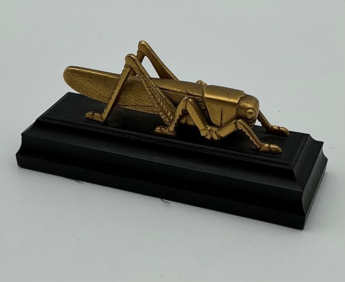 Lot 120 - A Martins Bank gilt metal Grasshopper desk...