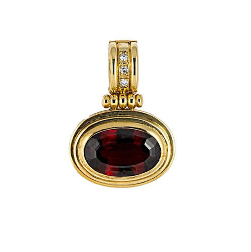 Lot 90 - A garnet and diamond pendant