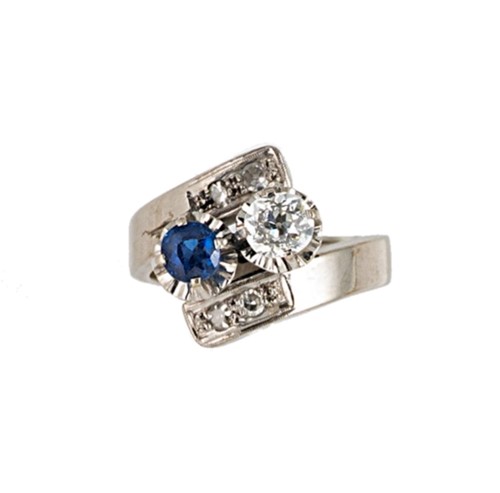 Lot 107 - A sapphire and diamond crossover ring