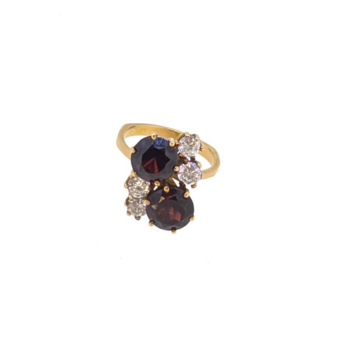 Lot 144 - A garnet and cubic zirconia ring