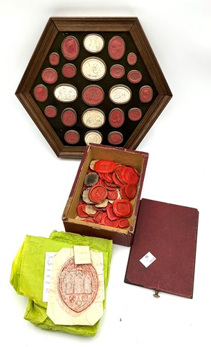 Lot 129 - 19th century plaster intaglios mounted on an...