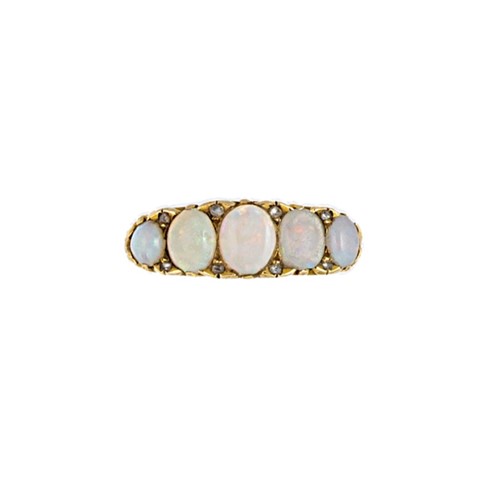 Lot 30 - An early 20th century opal and diamond carved half hoop ring