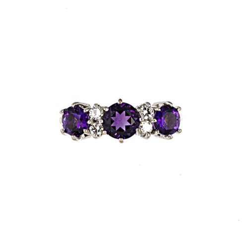 Lot 77 - Cropp & Farr - An 18ct gold late 20th century amethyst and diamond ring