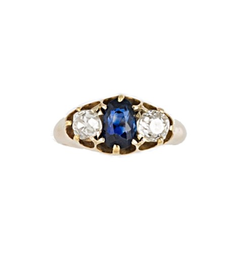 Lot 111 - An early 20th century sapphire and diamond three stone ring