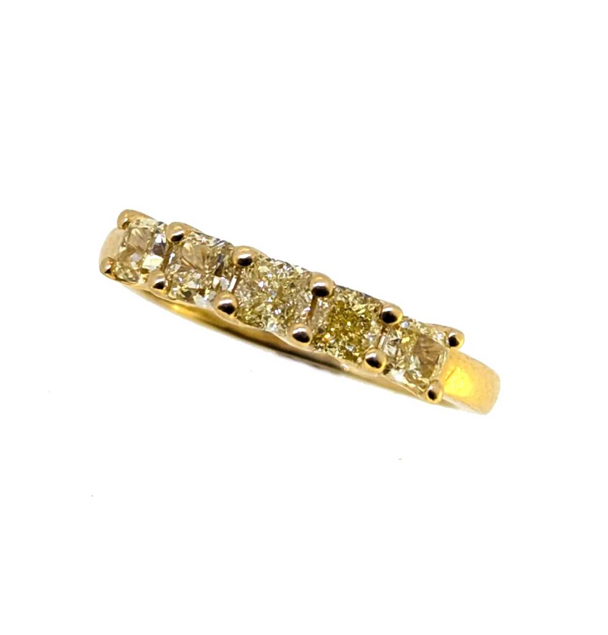 Lot 161 - An 18ct gold five stone fancy yellow diamond ring