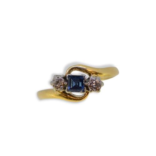 Lot 21 - 18ct gold sapphire and diamond three stone ring