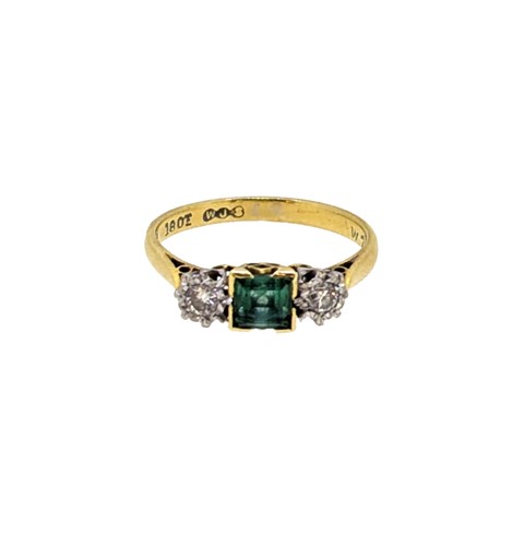 Lot 55 - An emerald and diamond three stone ring