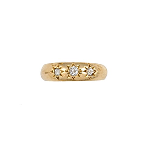 Lot 64 - An Edwardian 18ct gold diamond set band
