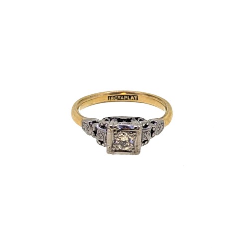 Lot 56 - An illusion set diamond solitaire ring