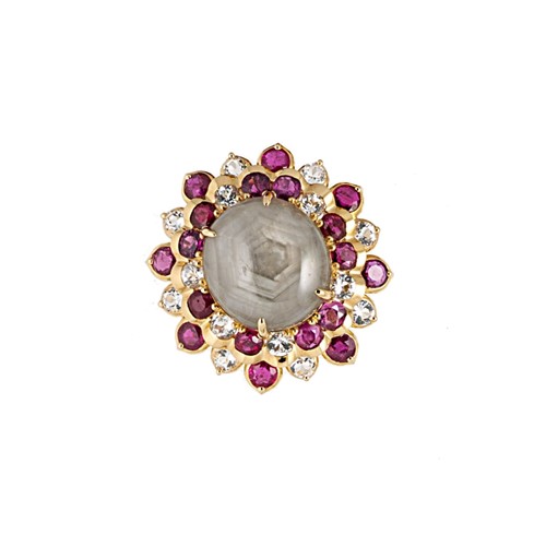 Lot 157 - A star sapphire, ruby and white sapphire cocktail ring