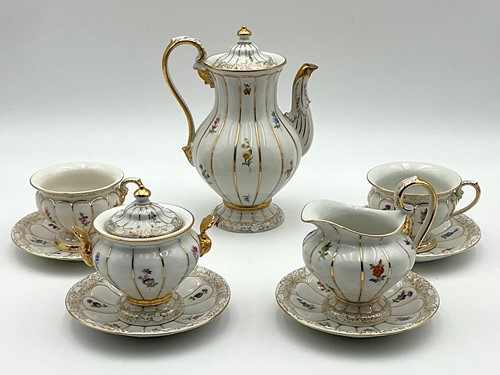 Lot 7 - A Meissen mocha set for four, painted with...