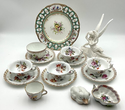 Lot 14 - A group of porcelain, to include a Meissen cup,...