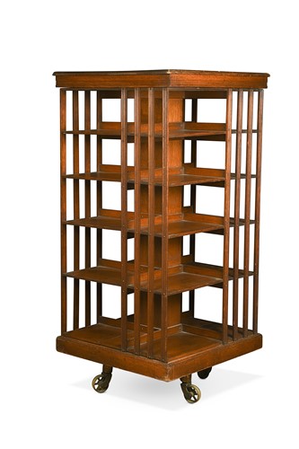 Lot 761 - An Edwardian oak revolving bookcase of country house proportions
