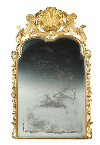 Lot 645 - A George III carved giltwood mirror