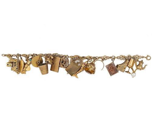 Lot 85 - A charm bracelet