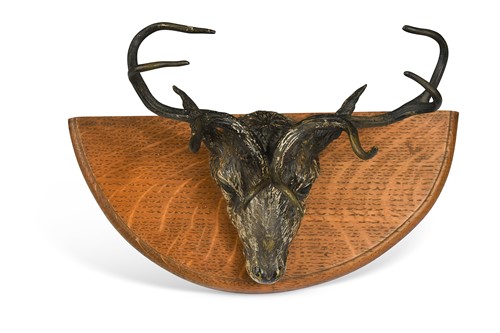 Lot 627 - An Austrian cold-painted bronze stag's head paper clip, early 20th century