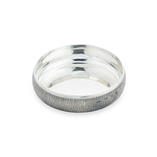 Lot 297 - Gerald Benney CBE (1930-2008), a silver bottle coaster