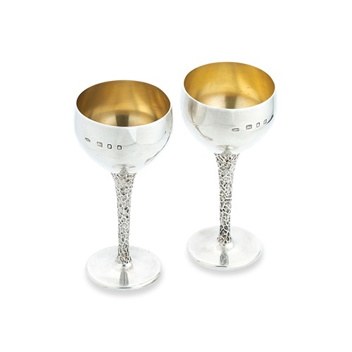 Lot 291 - Christopher Nigel Lawrence (1936-), a pair of silver wine goblets