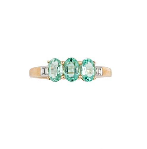Lot 131 - An 18ct gold three stone emerald ring