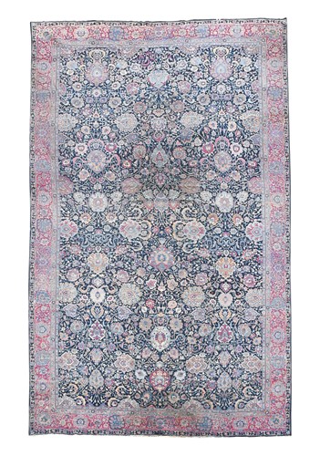 Lot 602 - A large Persian main carpet, possibly Kerman, circa 1930