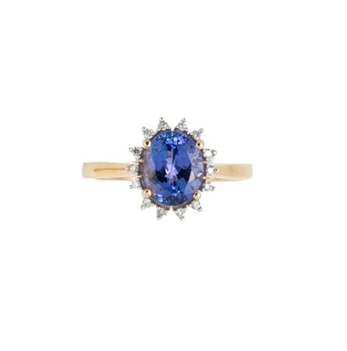 Lot 144 - An 18ct gold tanzanite and diamond cluster ring