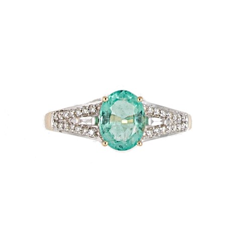 Lot 122 - An 18ct gold emerald and diamond ring