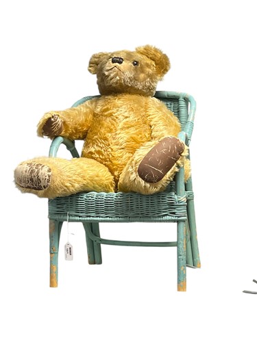 Lot 161 - A large gold plush teddy bear, with squeaker,...