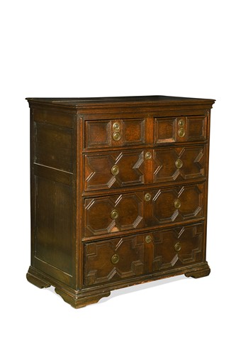 Lot 436 - A Charles II geometric moulded oak chest of drawers