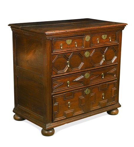 Lot 343 - A Charles II oak geometric moulded chest of drawers