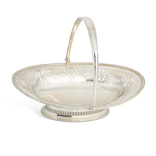 Lot 449 - A George V silver swing handled bread basket