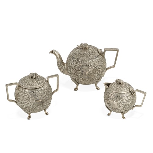 Lot 372 - A late 19th century Indian metalwares 3-piece bachelor's tea set