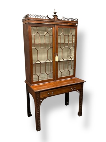 Lot 446 - A George III style mahogany bookcase, with...
