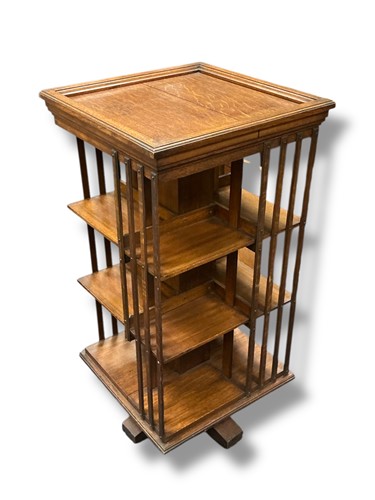 Lot 417 - An Edwardian oak revolving bookcase, 115 x 55...