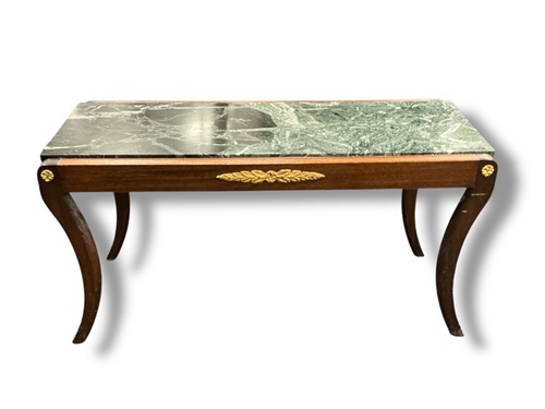 Lot 411 - A green marble seated bench on reeded sable...