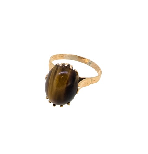 Lot 15 - A single stone tiger's eye dress ring
