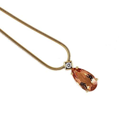 Lot 179 - An imperial topaz and diamond pendant and chain