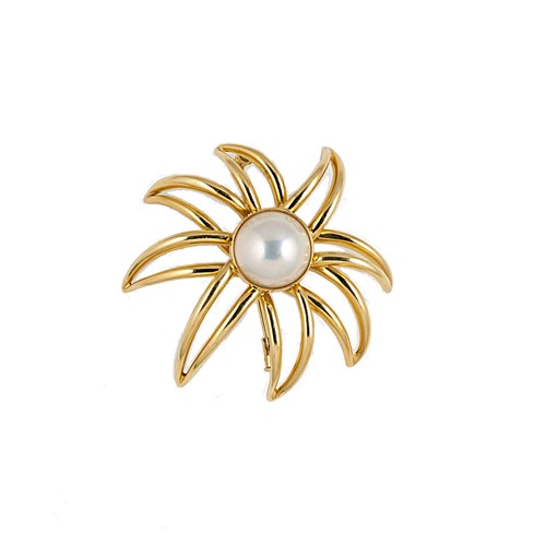 Lot 11 - Tiffany and Co. - An 18ct gold mabé pearl 'Fireworks' brooch