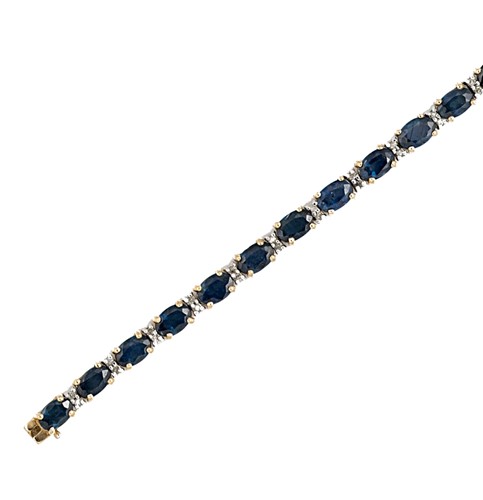 Lot 114 - A 9ct gold sapphire and diamond line bracelet