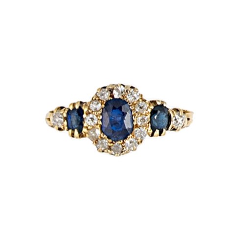 Lot 106 - A sapphire and diamond cluster ring